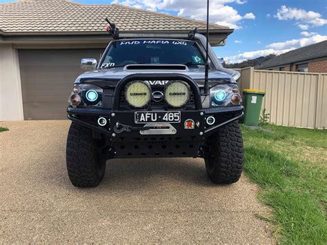 Nissan Navarra D22 Headlights With Multicoloured Halo Rings Dans