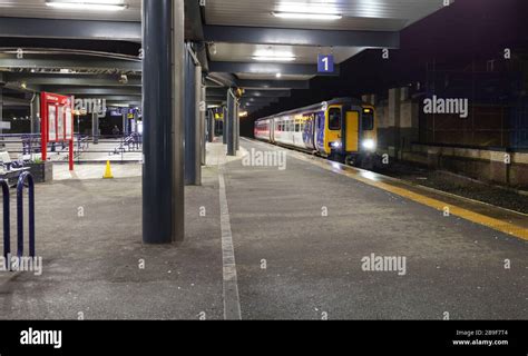 Northern Rail Class 156 Sprinter Train 156459 At Blackburn Railway Station On A Dark Night Stock