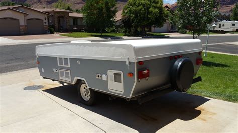 Popup Camper Make Over Here We Re Painted Our Dutchman Popup Camper Tent Trailer Remodel