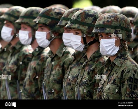 Honor Guards Wait Before A Welcoming Ceremony For Serbian President