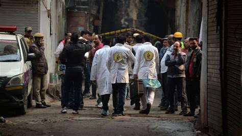 New Delhi Factory Fire Relatives Identify Victims From Photos On