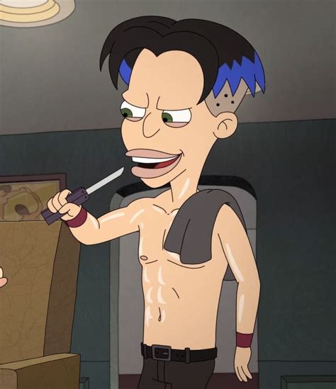 A Shirtless Man Holding A Knife In His Right Hand And Looking At