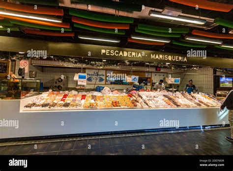 Fishmonger In Mercado De San Anton Madrid Spain Stock Photo Alamy