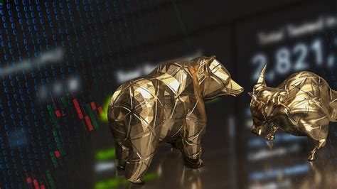 Premium Photo The Gold Bull And Bear On Chart For Business Concept D