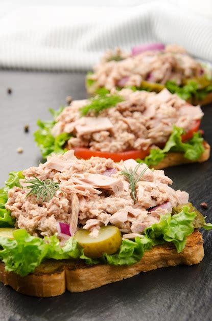 Premium Photo Tuna Sandwiches With Lettuce Tomatoes Pickles And