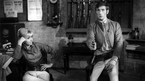 Angela Douglas And Jim Dale In A Production Still From Carry On Cowboy