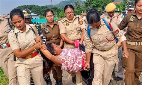 Women Stage Semi Nude Protest Against Eviction Drive In Guwahati ஆக்கிரமிப்பு அகற்றுவதை