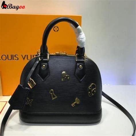 Louis Vuitton Black Leather Bag. Charming is indeed the word for the ...