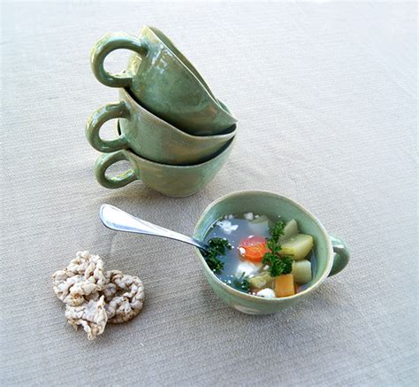 Green soup bowls with handle and curved edge on Behance