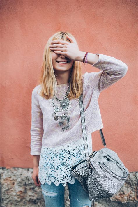 Beautiful Blonde In Front Of A Pink Wall By Stocksy Contributor Maja Topcagic Stocksy
