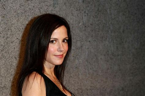 Download Mary Louise Parker Striking A Stunning Pose Wallpaper