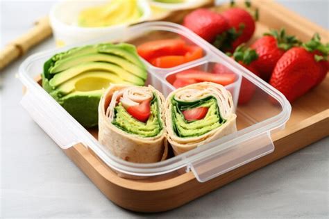 Premium Photo Turkey And Avocado Wrap In A Lunchbox