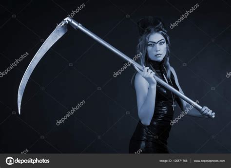 Beautiful woman with a scythe low key portrait Stock Photo by ©Milkin ...