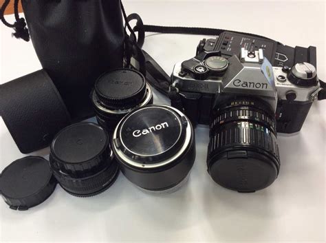 Lot 855 - Canon AE-1 camera and lenses