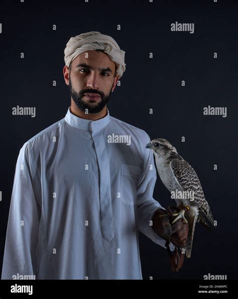 Young Falconer Holding A Bird Of Prey Stock Photo Alamy