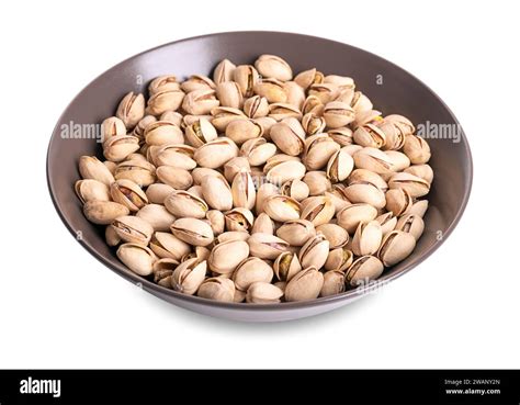 Roasted And Salted Pistachios In Their Shells In A Brown Bowl Crunchy