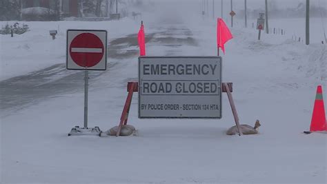 Ontario Canada February 2014 Road Closed Sign In Winter Snow Storm And