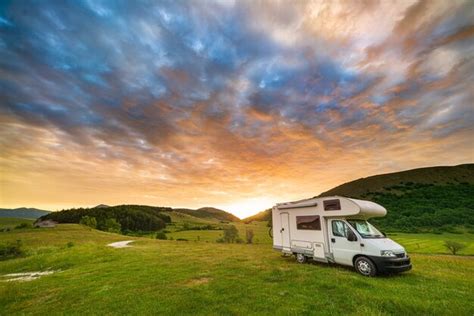 Premium Photo Sunset Dramatic Sky Over Camper Van In Montelago