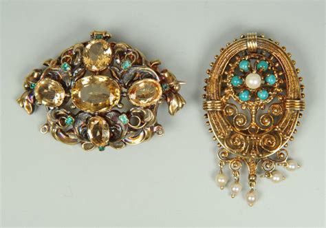 Lot 275: Two 14K Victorian Brooches