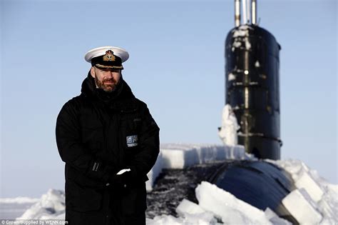 Royal Navy submarine crew enjoy a game of cricket at the North Pole ...