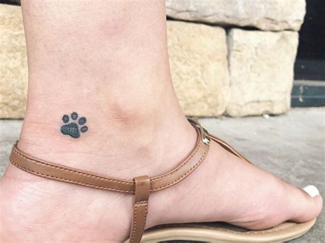 20 Best Paw Print Tattoos On Foot The Paws Pawprint Tattoo Dog