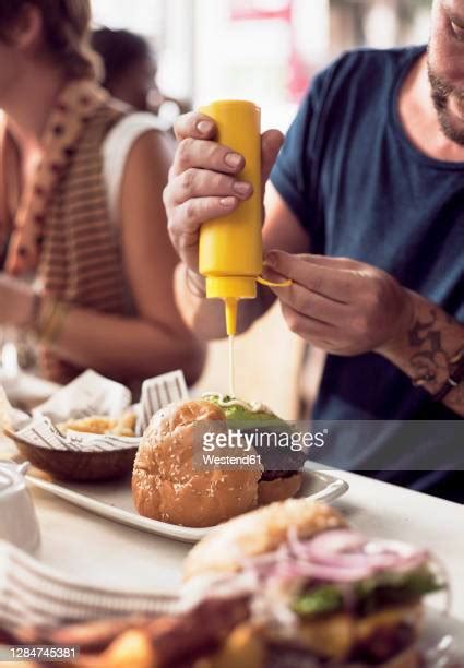 202 Man Eating Veggie Burger Stock Photos, High-Res Pictures, and ...