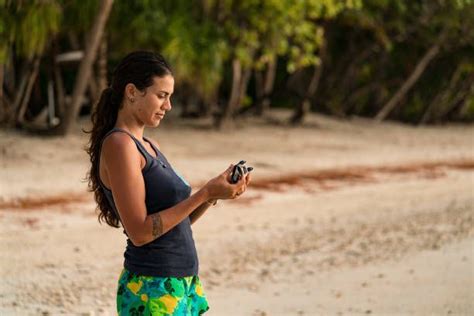 Tumi Brando Holds A Turtle On The Beach Of Tetiaroa Marlon Brando