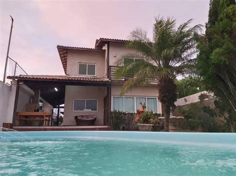 Mansão de frente pro mar piscina e área de festas ponta da fruta