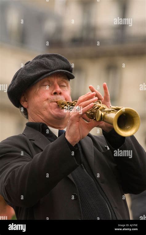 France, Paris, Street band soprano sax player Stock Photo - Alamy