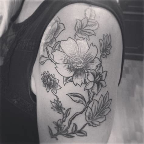 Awesome Gray Ink Vintage Flowers Tattoo On Upper Arm Tattooimages Biz