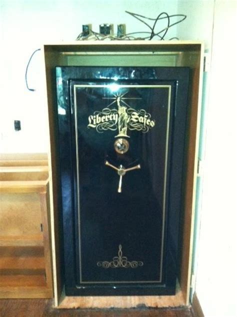 Liberty gun safe placed inside a cabinet - Tarrant County Lock & Safe