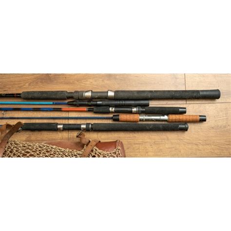 A Quantity Of Vintage Fishing Equipment To Include Five Rods Together