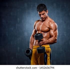 Handsome Muscular Men Lifting Weights Stock Photo 1452636794 Shutterstock