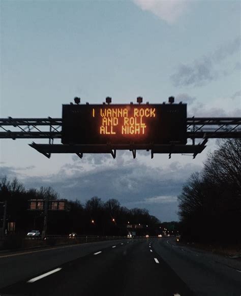 A Highway Sign That Reads I Wanna Rock All Night