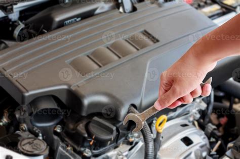 Hand Of Auto Mechanic With Wrench 8906140 Stock Photo At Vecteezy