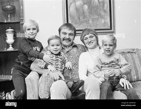 Dick Butkus, center, is shown with his family, from left: Nikki, 6; Butkus holding son Matt, 20 ...