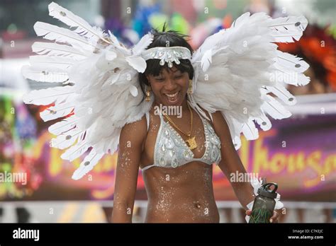 A Parade Participant In Festive Attire At The West Indian American Day