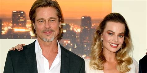 Margot Robbie Reveals How She Made Her Unscripted Brad Pitt Kiss Happen