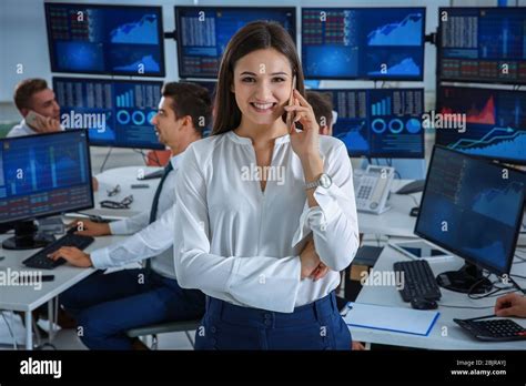 Female Stock Trader Working In Office Stock Photo Alamy