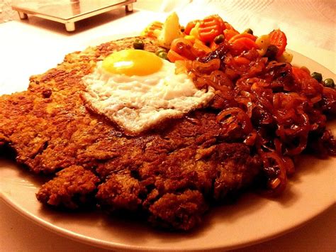 Vegetarisches Schnitzel Mit Geschmorten Schalotten Von