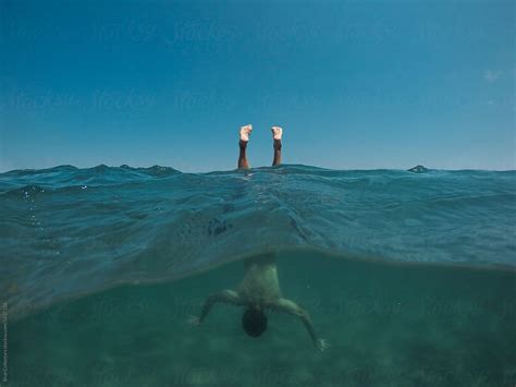 Underwater Person Floating In Water