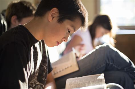 Young Boy Reading the Scriptures