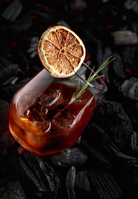 Old Fashioned Cocktail With Whiskey Ice Orange And Rosemary Stock