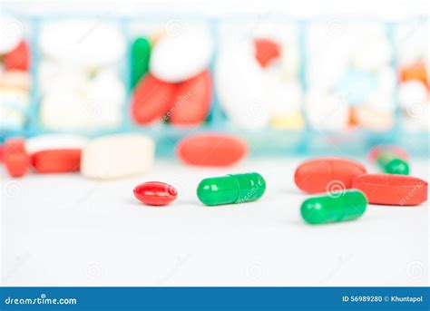 Medicine Tablet and Capsule in Weekly Pill Box Stock Photo - Image of ...