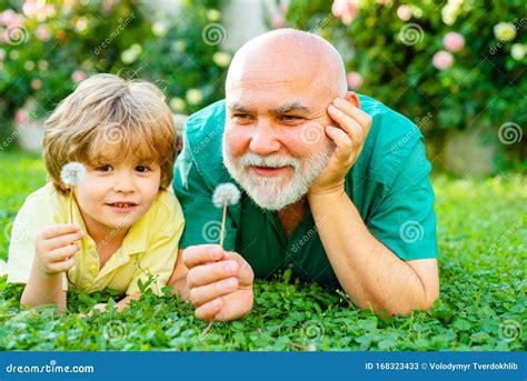 Father And Grandfather Portrait Of Happy Senior Man Father Smiling And