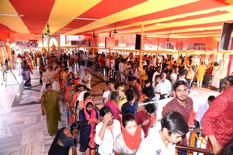 Hindu Devotees Stand In Queues To Offer Prayers At Mahavir Temple