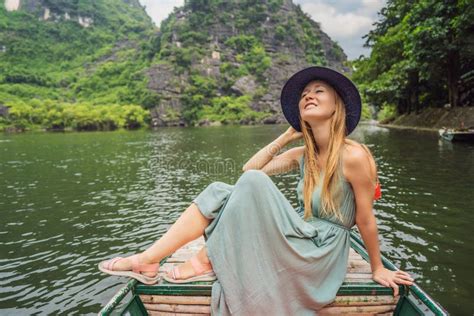 Man Tourist In Trang An Scenic Landscape Complex In Ninh Binh Province