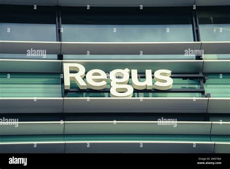 Vilnius, Lithuania - November 9, 2022: Regus logo sign on modern office wall. Regus is part of ...