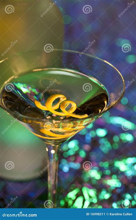 Martini with a lemon twist stock image. Image of beverage - 16998211