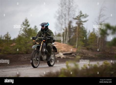 A Finnish Soldier Rides A Dirt Bike During Hammer 22 An Annual